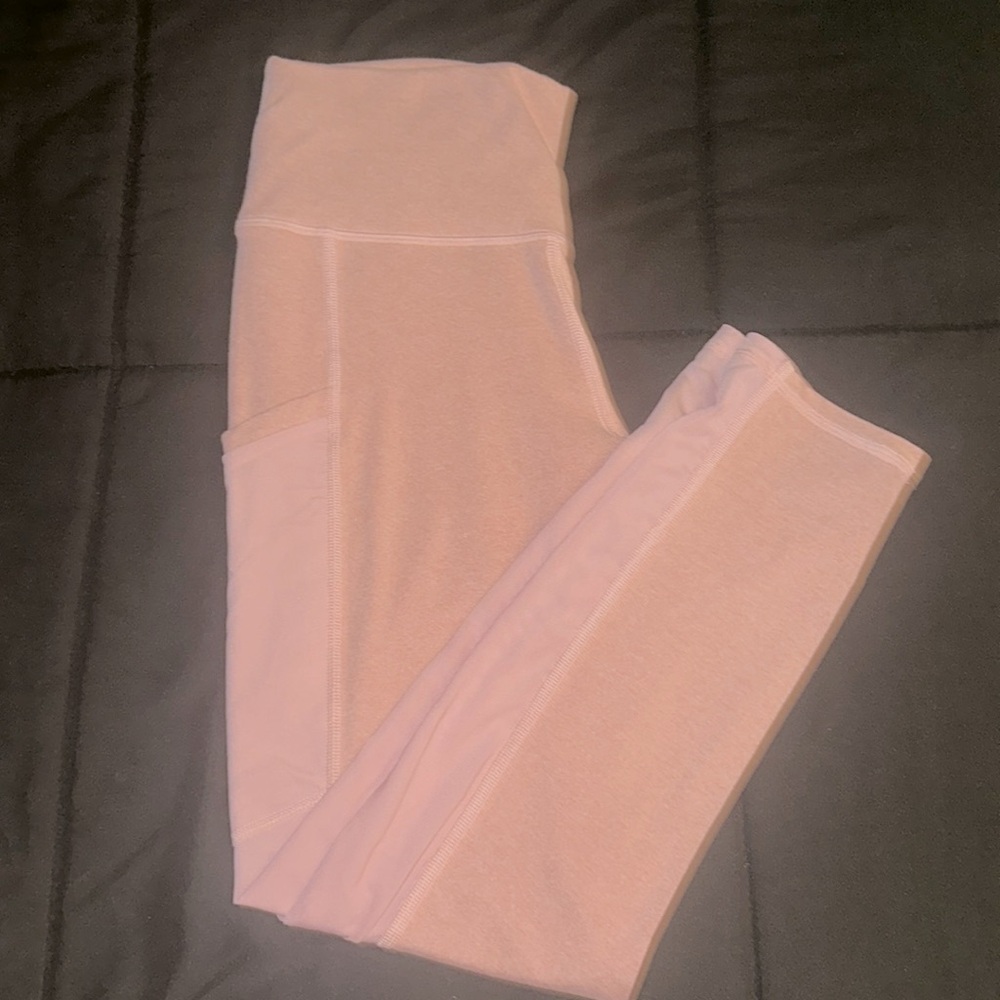 Fabletics leggings with sheer side, and pockets. Beautiful pink, like new!